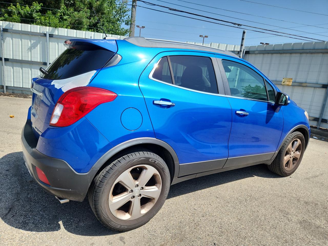 2015 Buick Encore Convenience Blue vin: KL4CJBSB5FB217054 Damage: Right Rear Door, Multiple Scratches Heavy, 2
