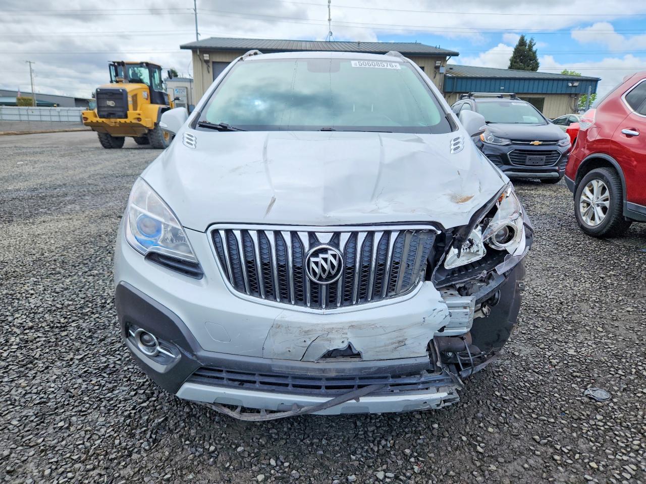 2015 Buick Encore Convenience Серебряный vin: KL4CJBSB7FB034030
