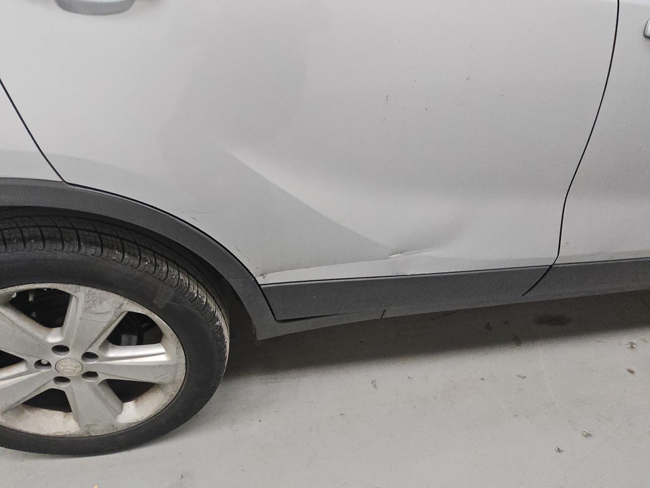 2015 Buick Encore Premium Silver vin: KL4CJDSB3FB260447 Damage: Right Rear Door, Dent(S) W/ Paint Dmg, > 12 Inches