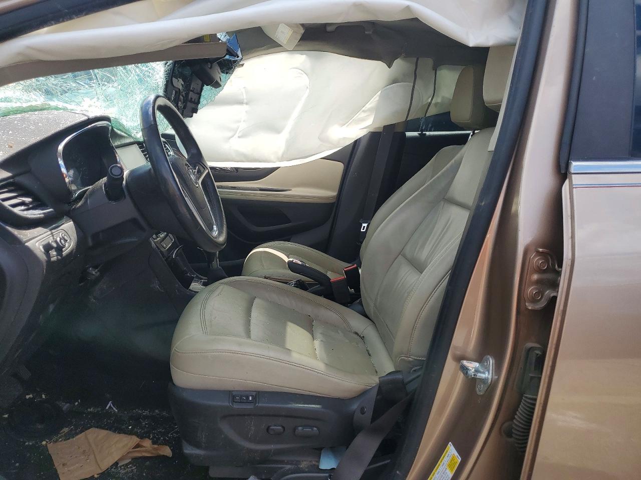2018 Buick Encore Essence Желто-коричневый vin: KL4CJGSM3JB626225