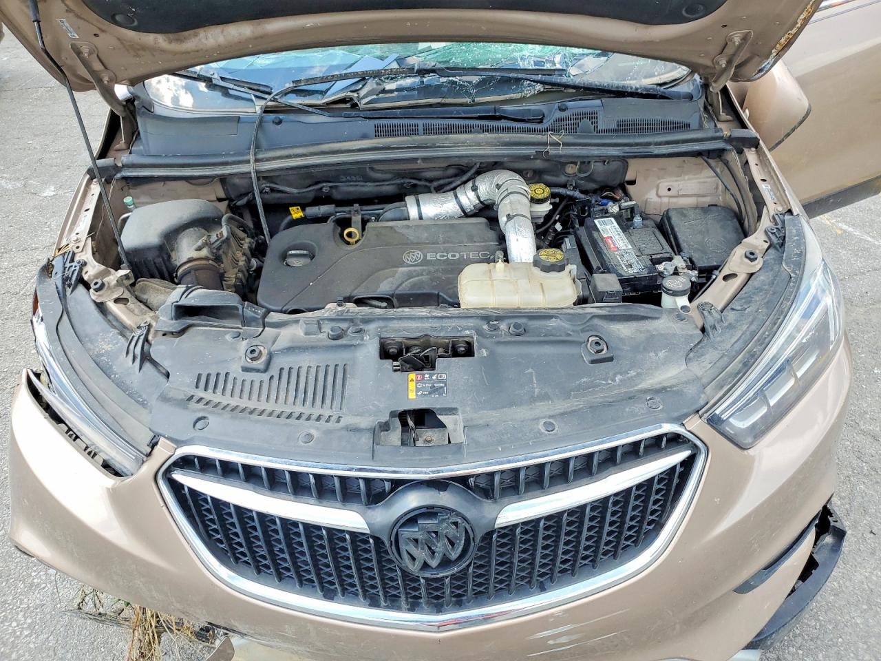 2018 Buick Encore Essence Желто-коричневый vin: KL4CJGSM3JB626225