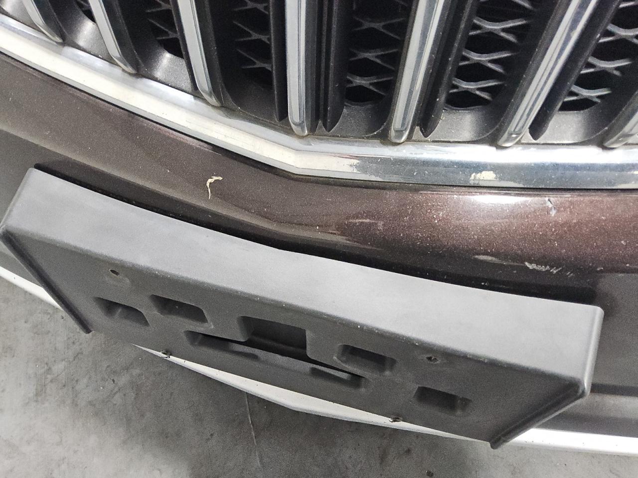2015 Buick Encore Premium Brown vin: KL4CJHSB0FB060682 Damage: Front Bumper/Cover, Scraped, 3 To 4 Inches