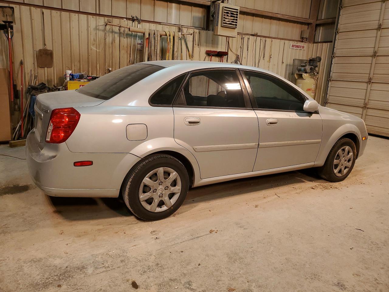 2004 Suzuki Forenza S Silver vin: KL5JD52Z14K048088