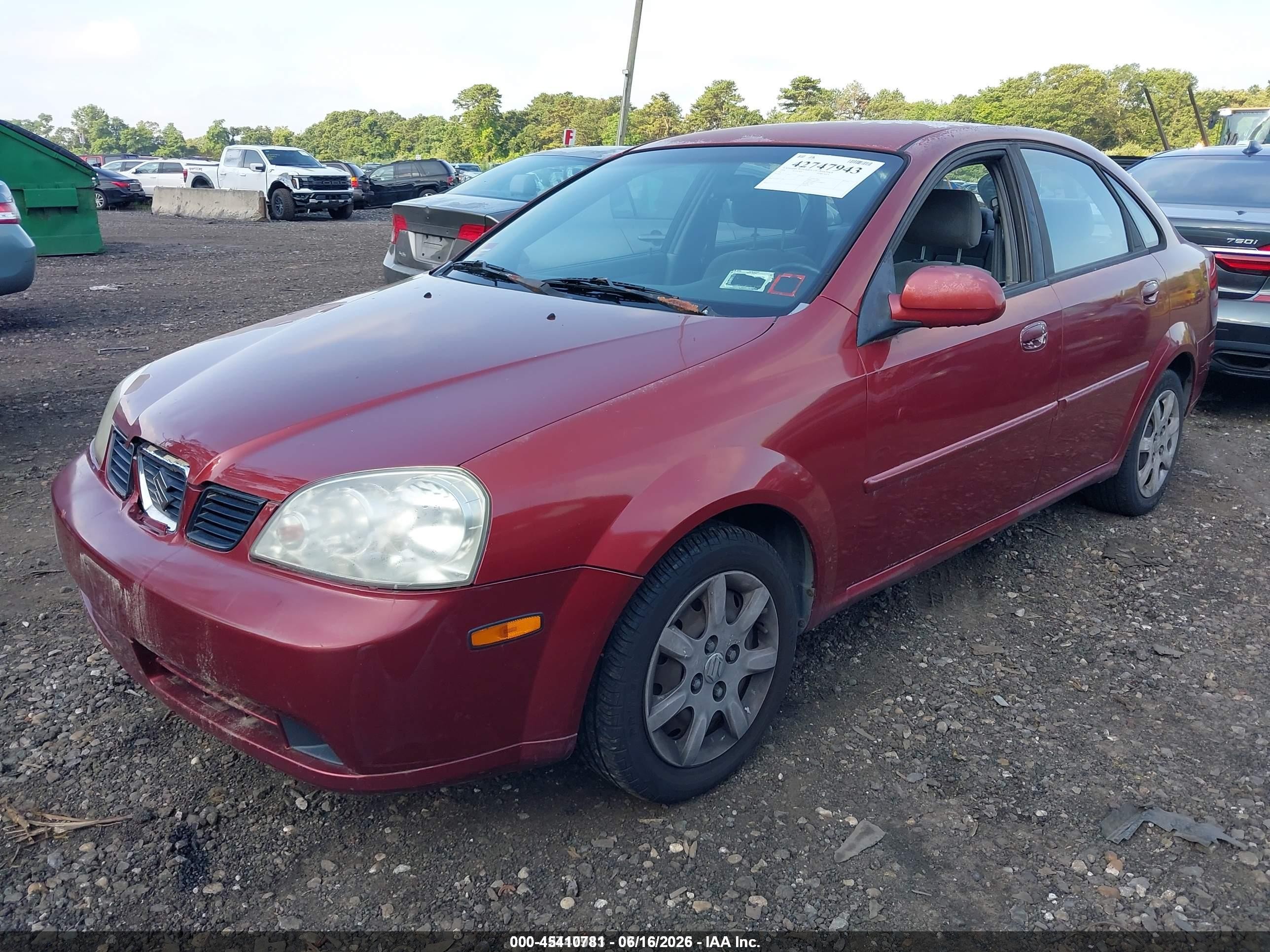 2004 Suzuki Forenza S Red vin: KL5JD52Z14K969999