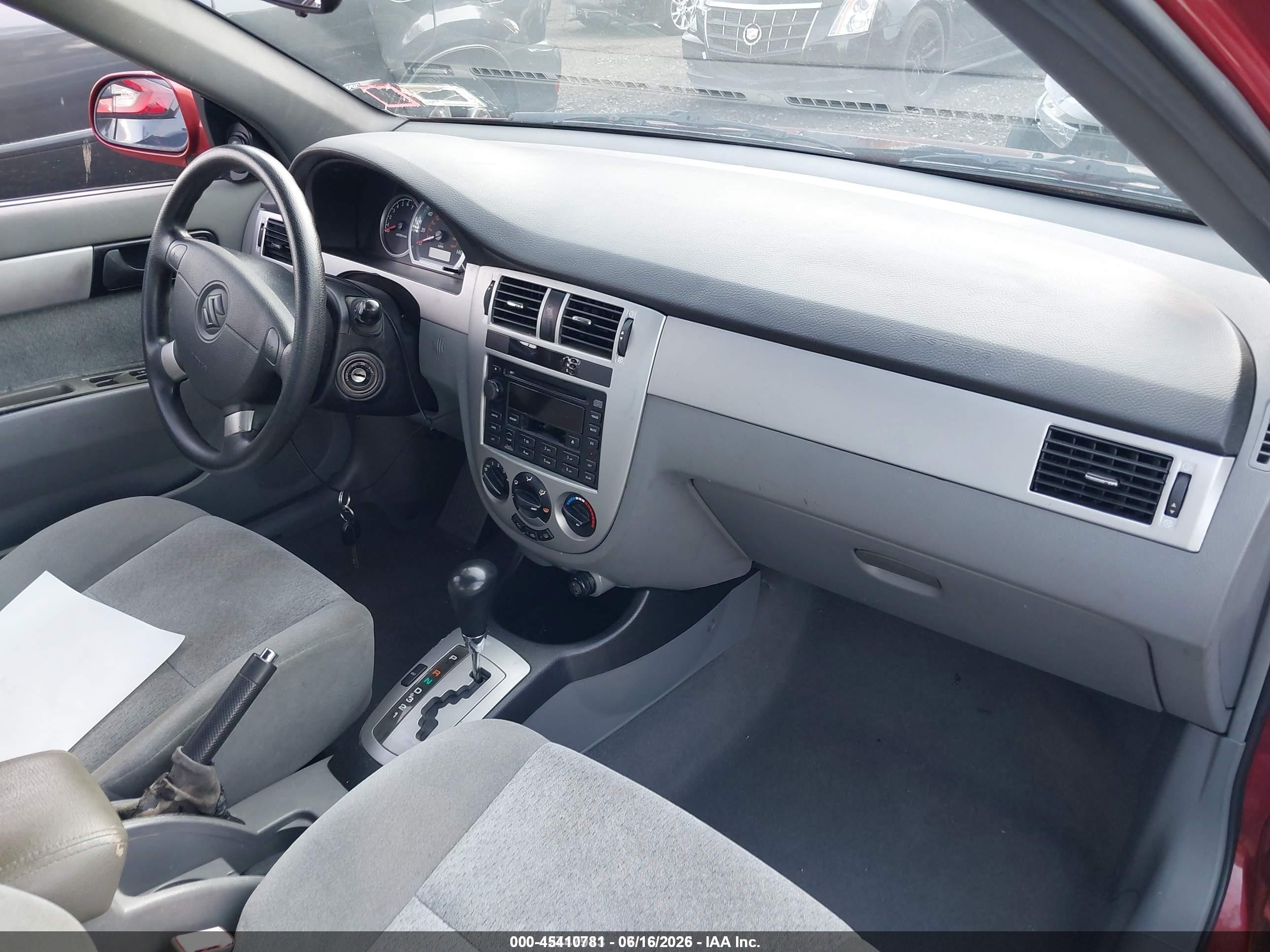 2004 Suzuki Forenza S Red vin: KL5JD52Z14K969999