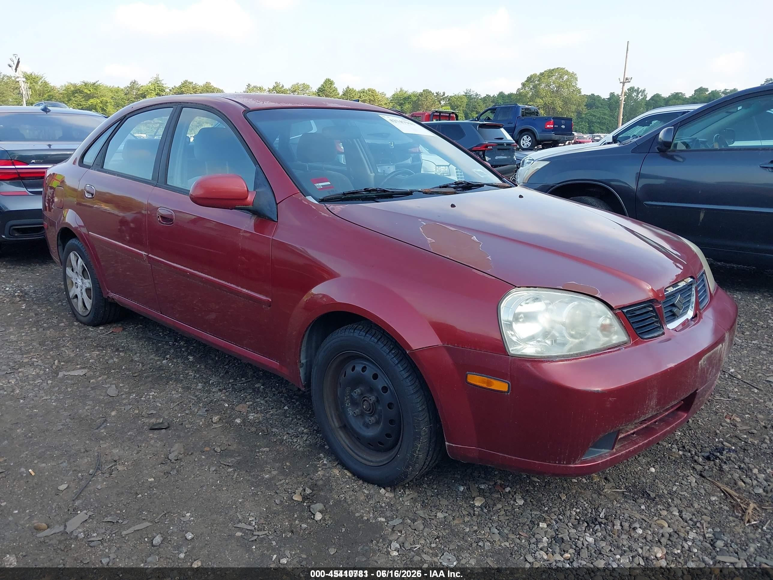 2004 Suzuki Forenza S Red vin: KL5JD52Z14K969999