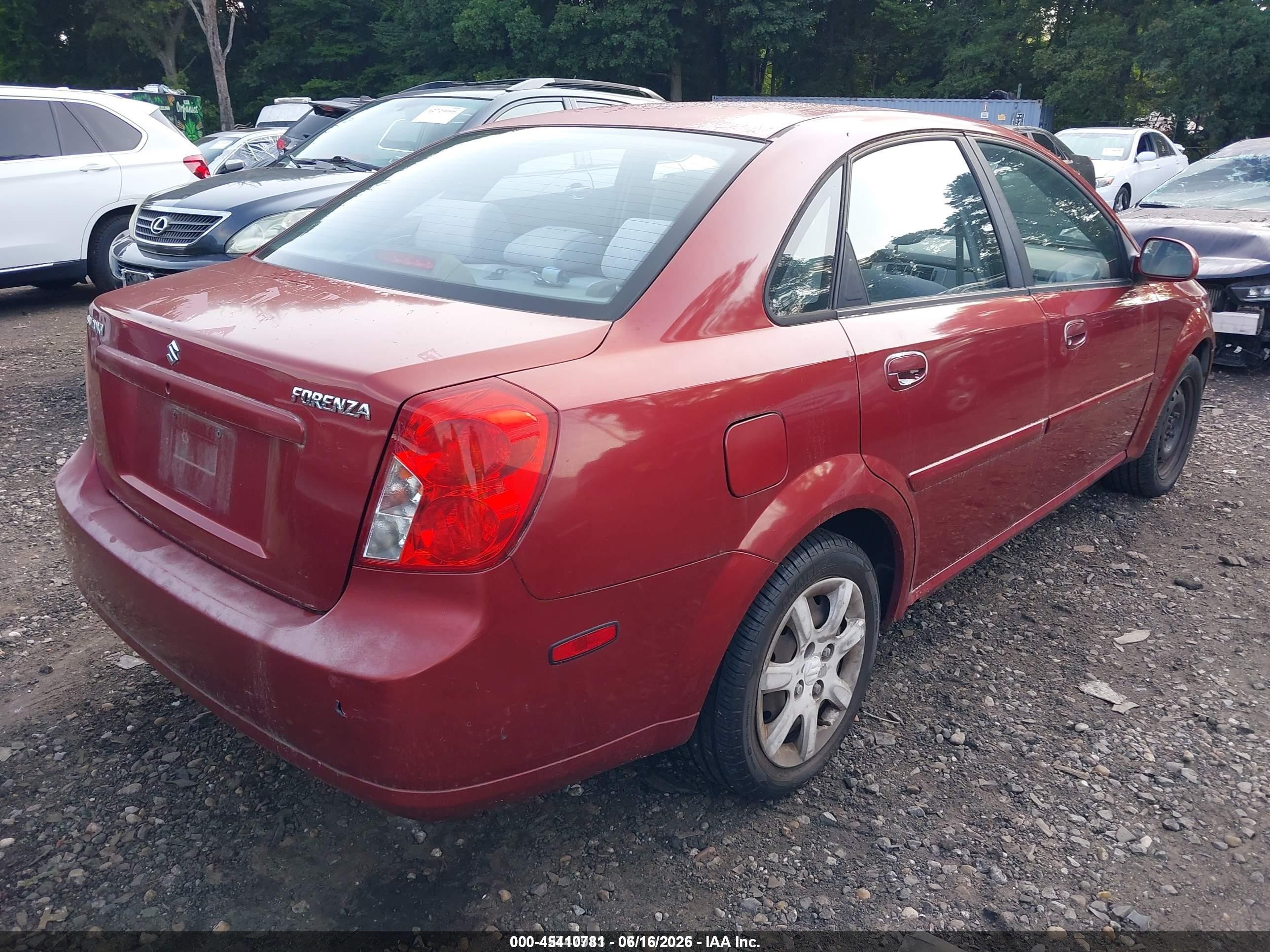 2004 Suzuki Forenza S Red vin: KL5JD52Z14K969999