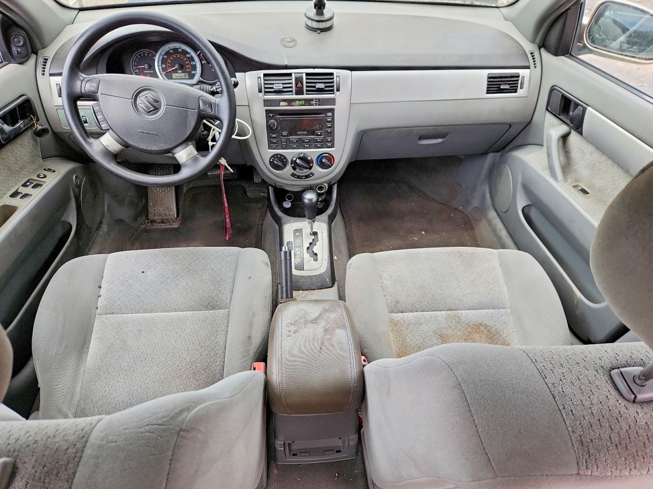 2004 Suzuki Forenza S Tan vin: KL5JD52Z34K946529