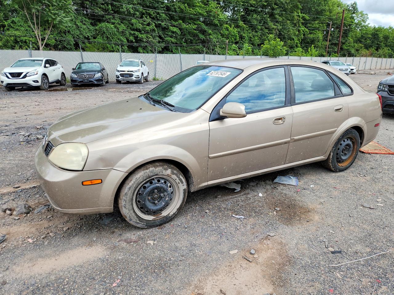 2004 Suzuki Forenza S Tan vin: KL5JD52Z34K946529