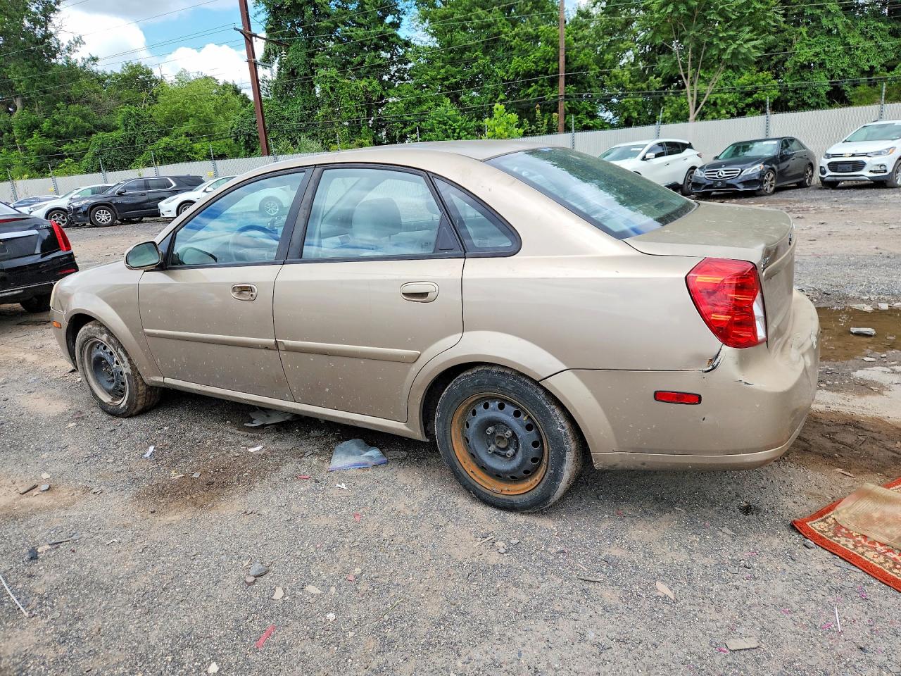 2004 Suzuki Forenza S Tan vin: KL5JD52Z34K946529