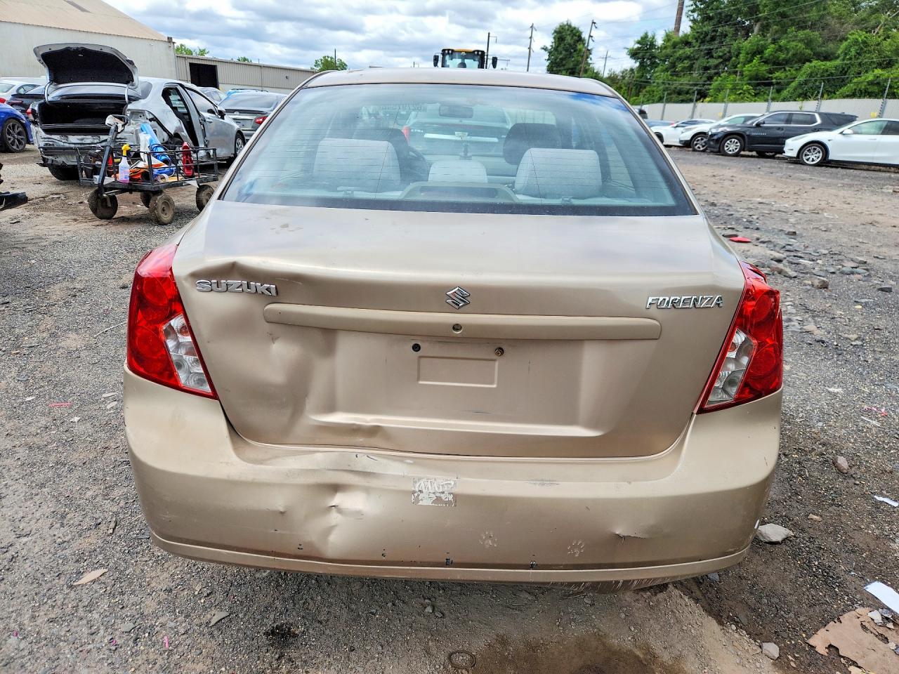 2004 Suzuki Forenza S Tan vin: KL5JD52Z34K946529