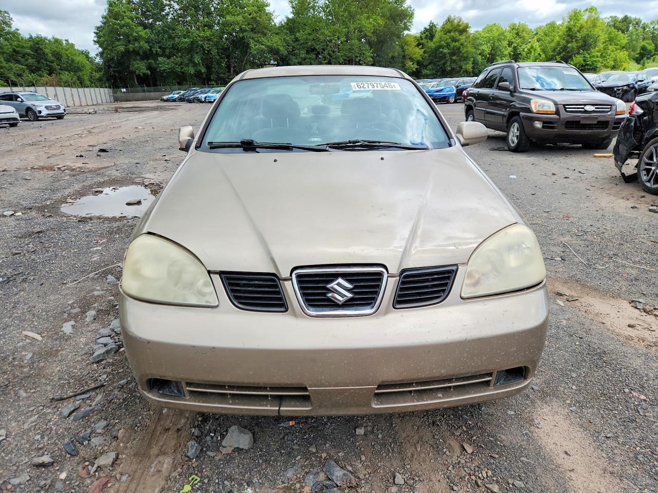 2004 Suzuki Forenza S Tan vin: KL5JD52Z34K946529