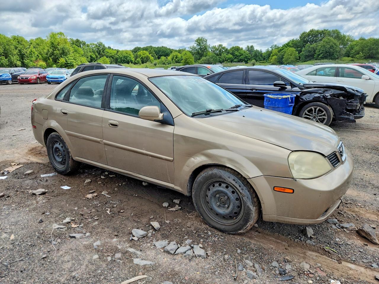 2004 Suzuki Forenza S Tan vin: KL5JD52Z34K946529