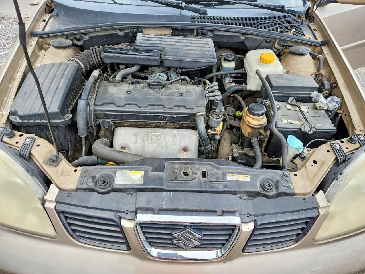 2004 Suzuki Forenza S Tan vin: KL5JD52Z34K946529