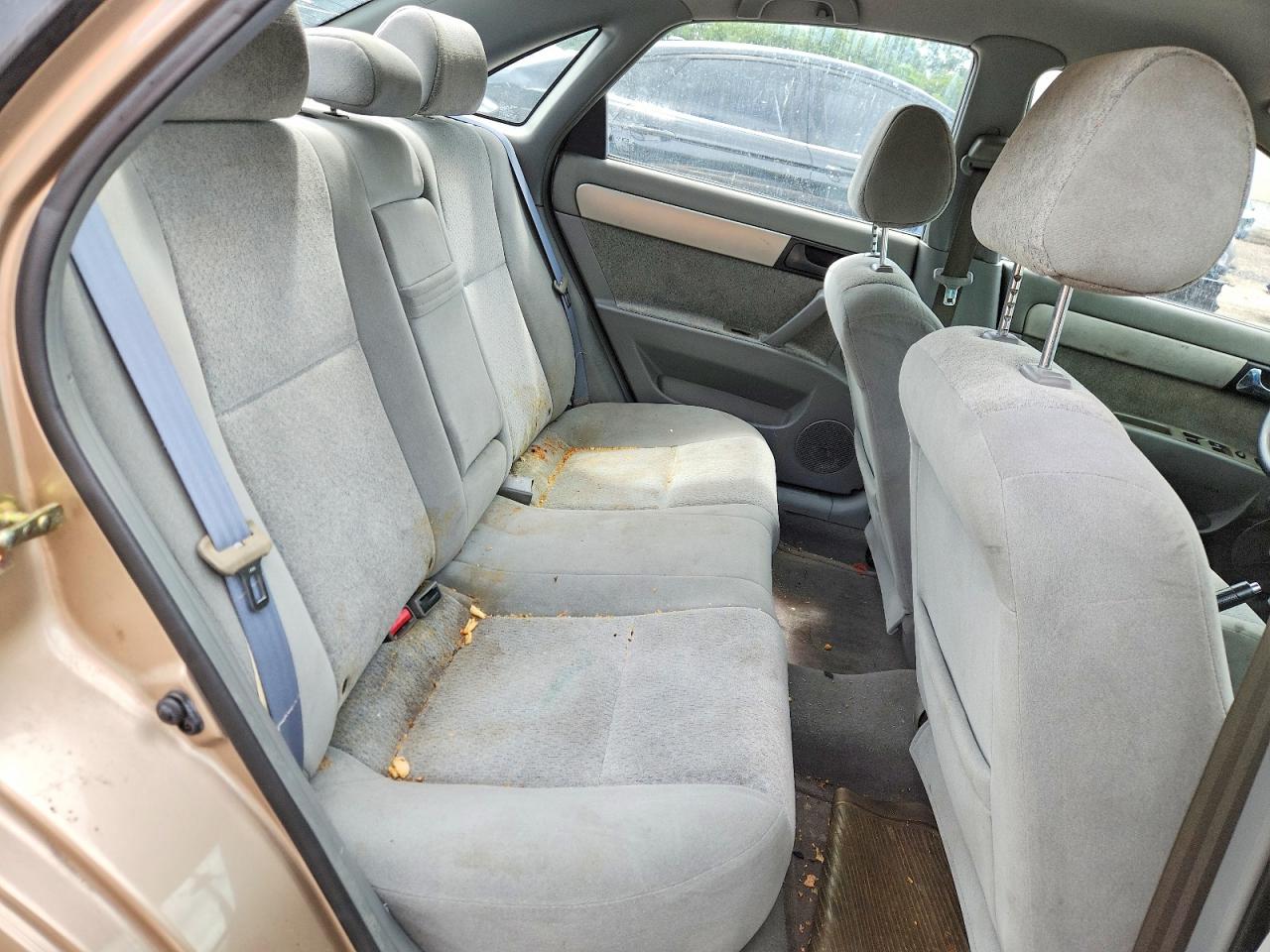 2004 Suzuki Forenza S Tan vin: KL5JD52Z34K946529