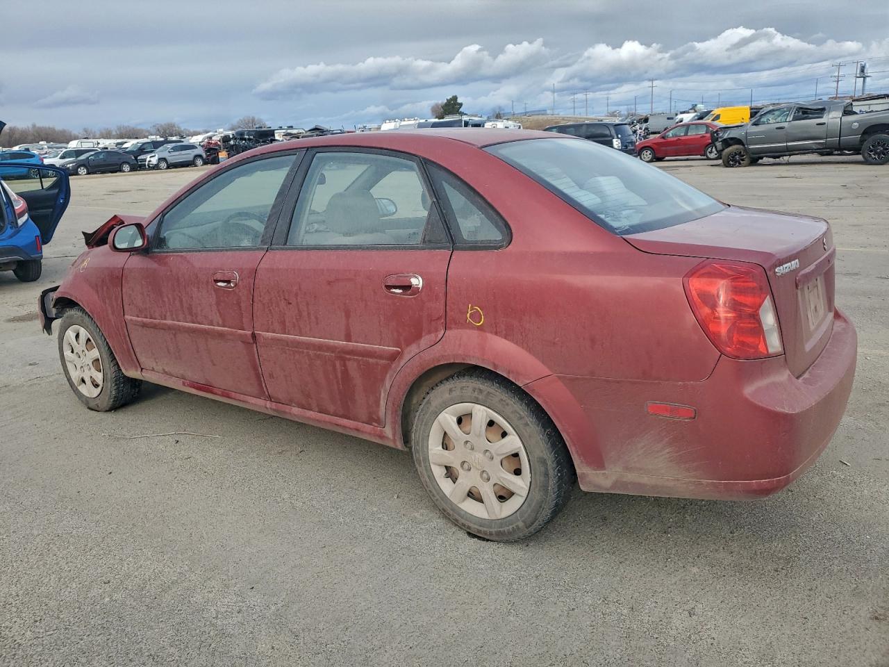 2004 Suzuki Forenza S Red vin: KL5JD52Z44K955241