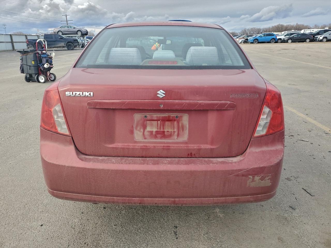 2004 Suzuki Forenza S Red vin: KL5JD52Z44K955241