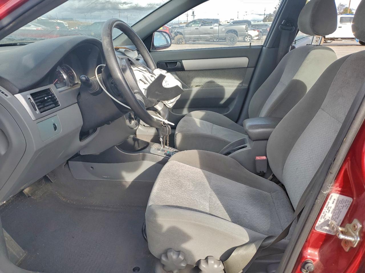2004 Suzuki Forenza S Red vin: KL5JD52Z44K955241