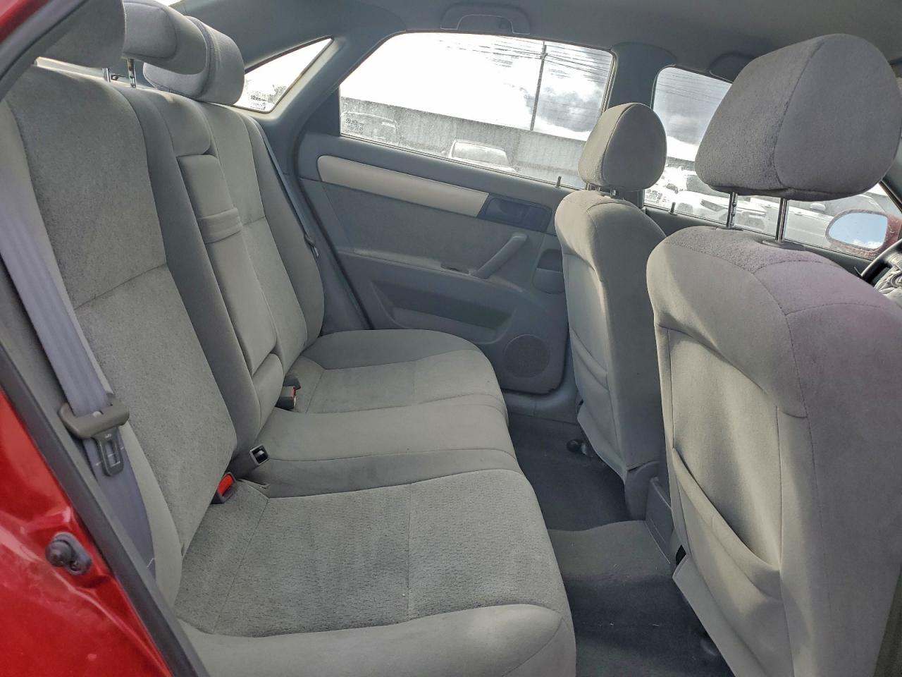 2004 Suzuki Forenza S Red vin: KL5JD52Z44K955241