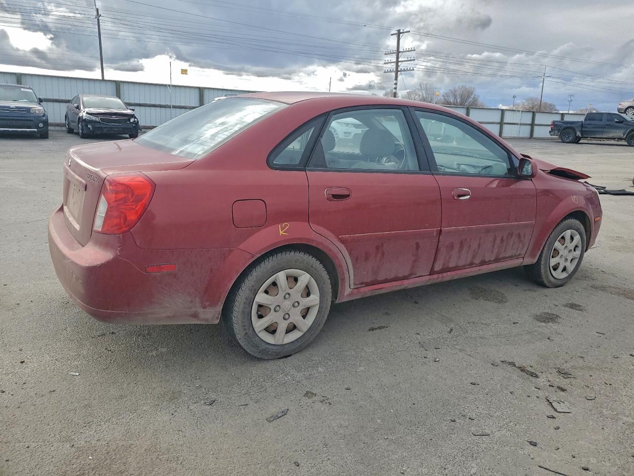 2004 Suzuki Forenza S Red vin: KL5JD52Z44K955241