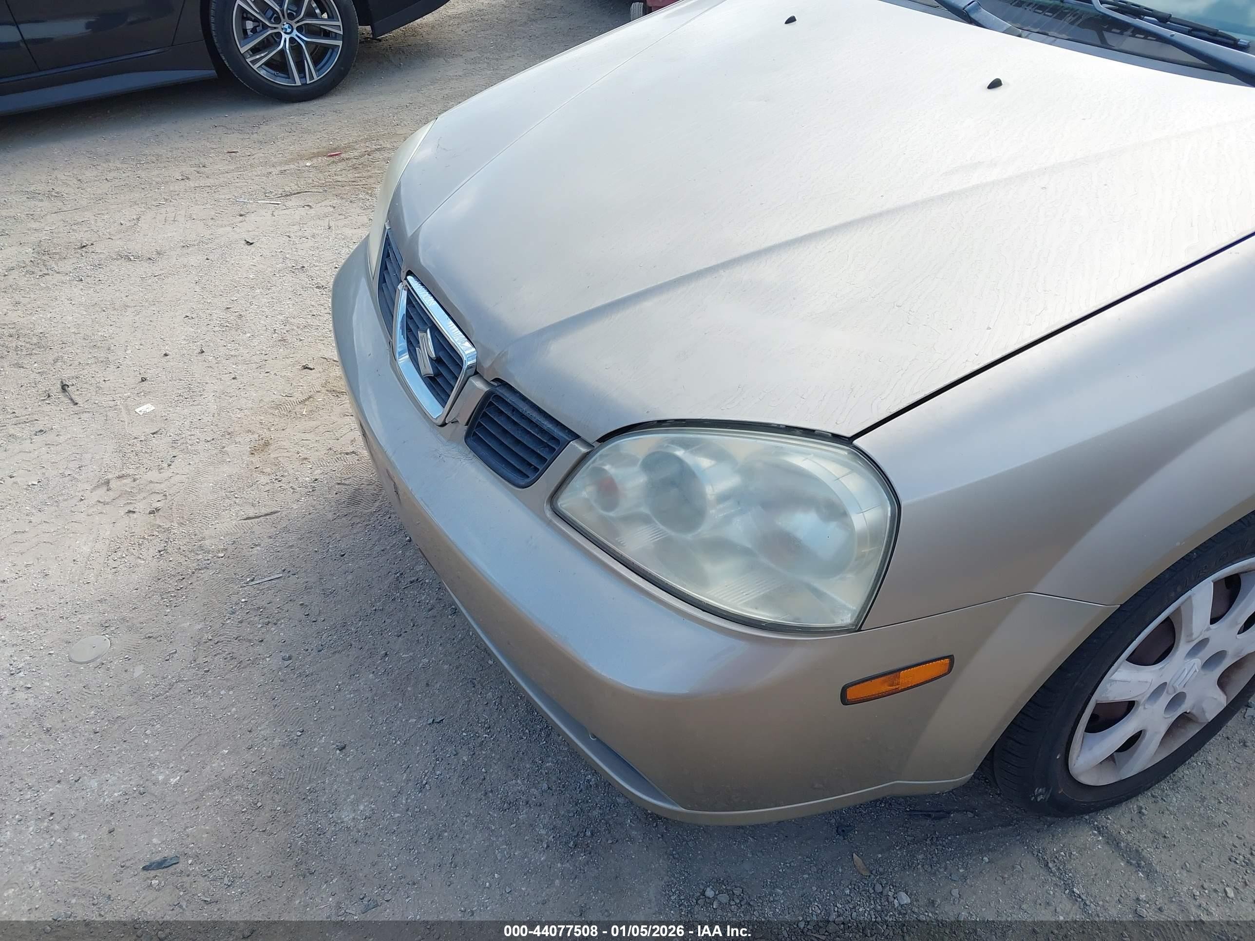 2004 Suzuki Forenza S Gold vin: KL5JD52Z64K953877