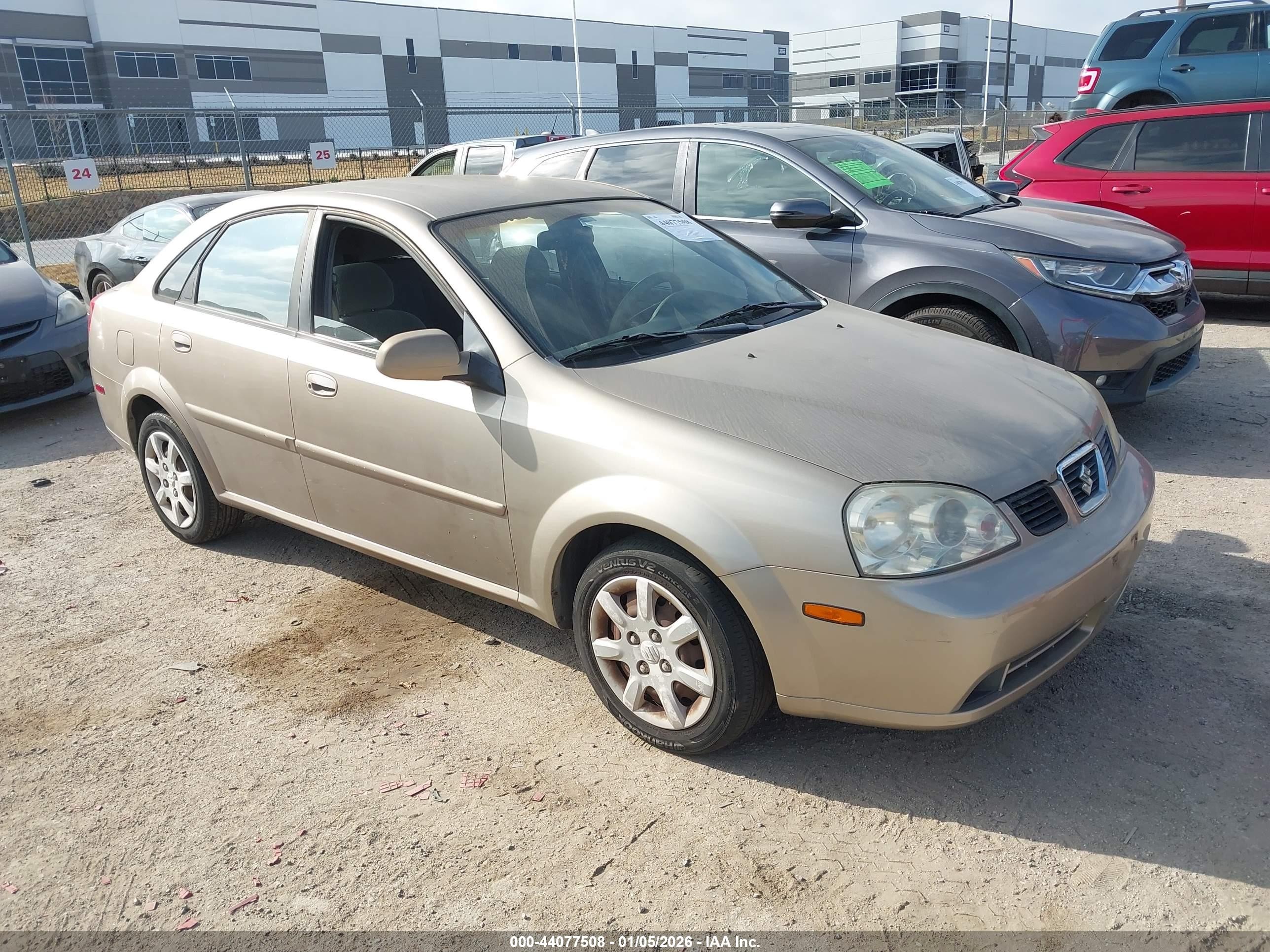 2004 Suzuki Forenza S Gold vin: KL5JD52Z64K953877