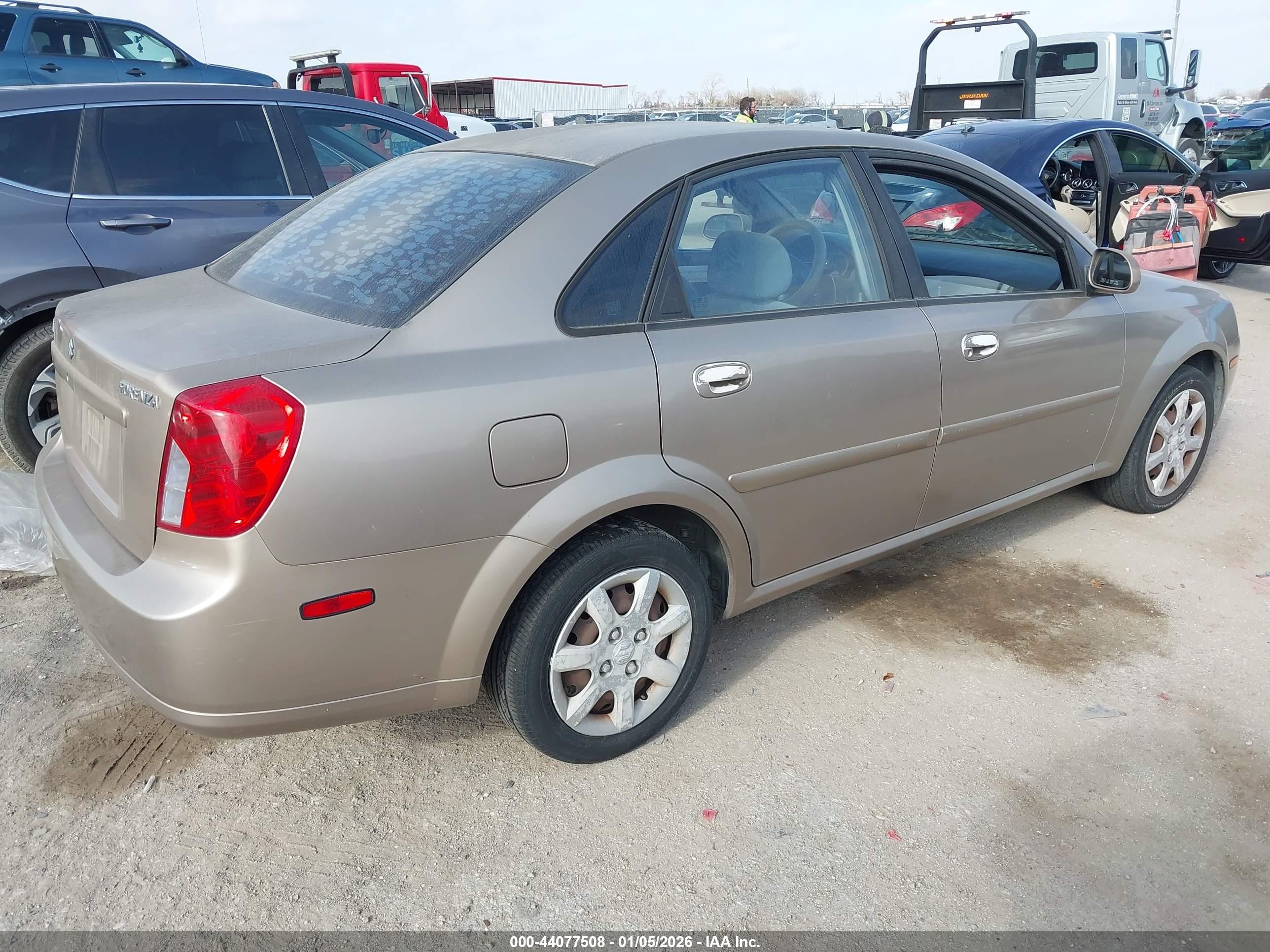 2004 Suzuki Forenza S Gold vin: KL5JD52Z64K953877