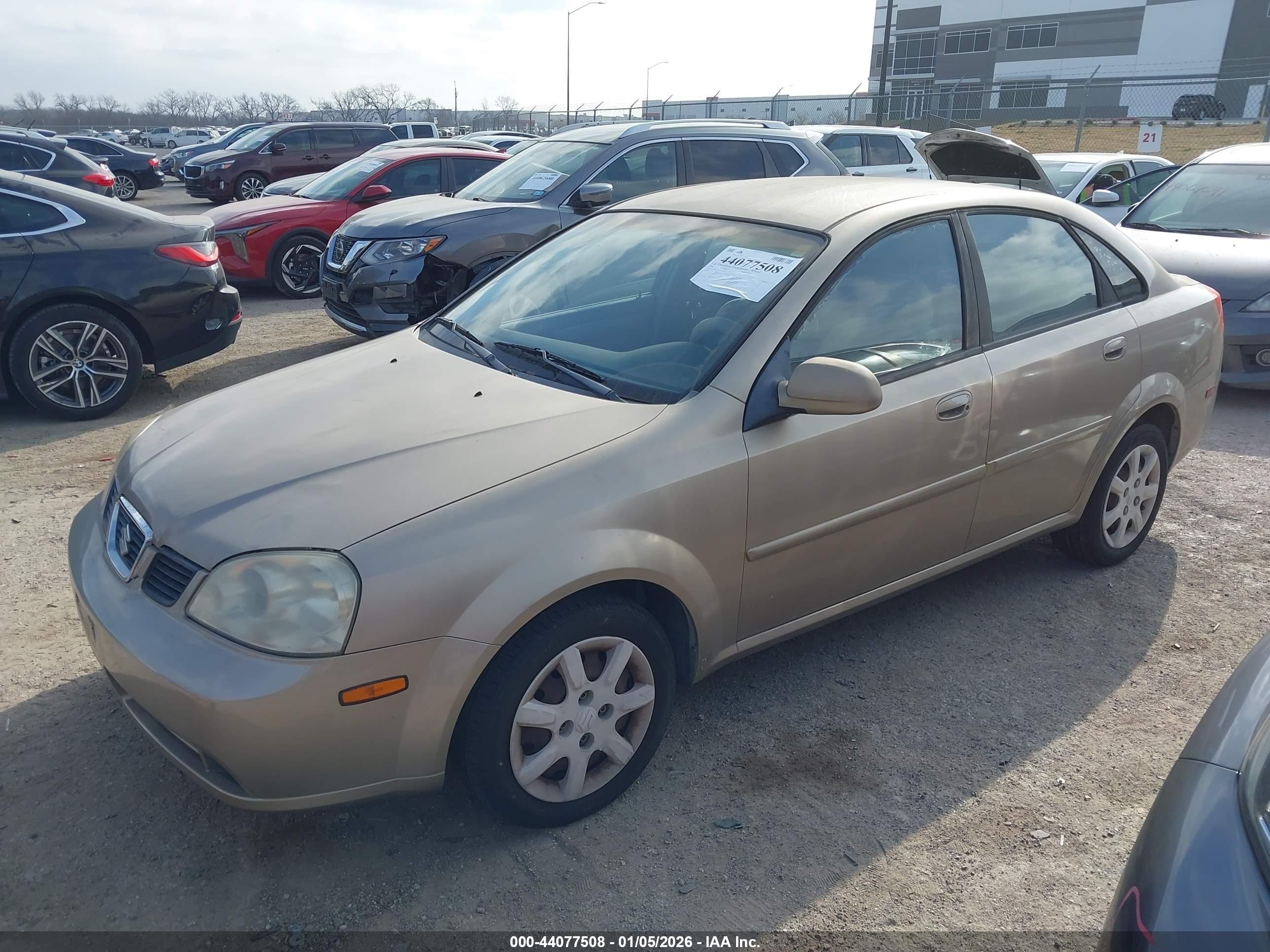 2004 Suzuki Forenza S Gold vin: KL5JD52Z64K953877