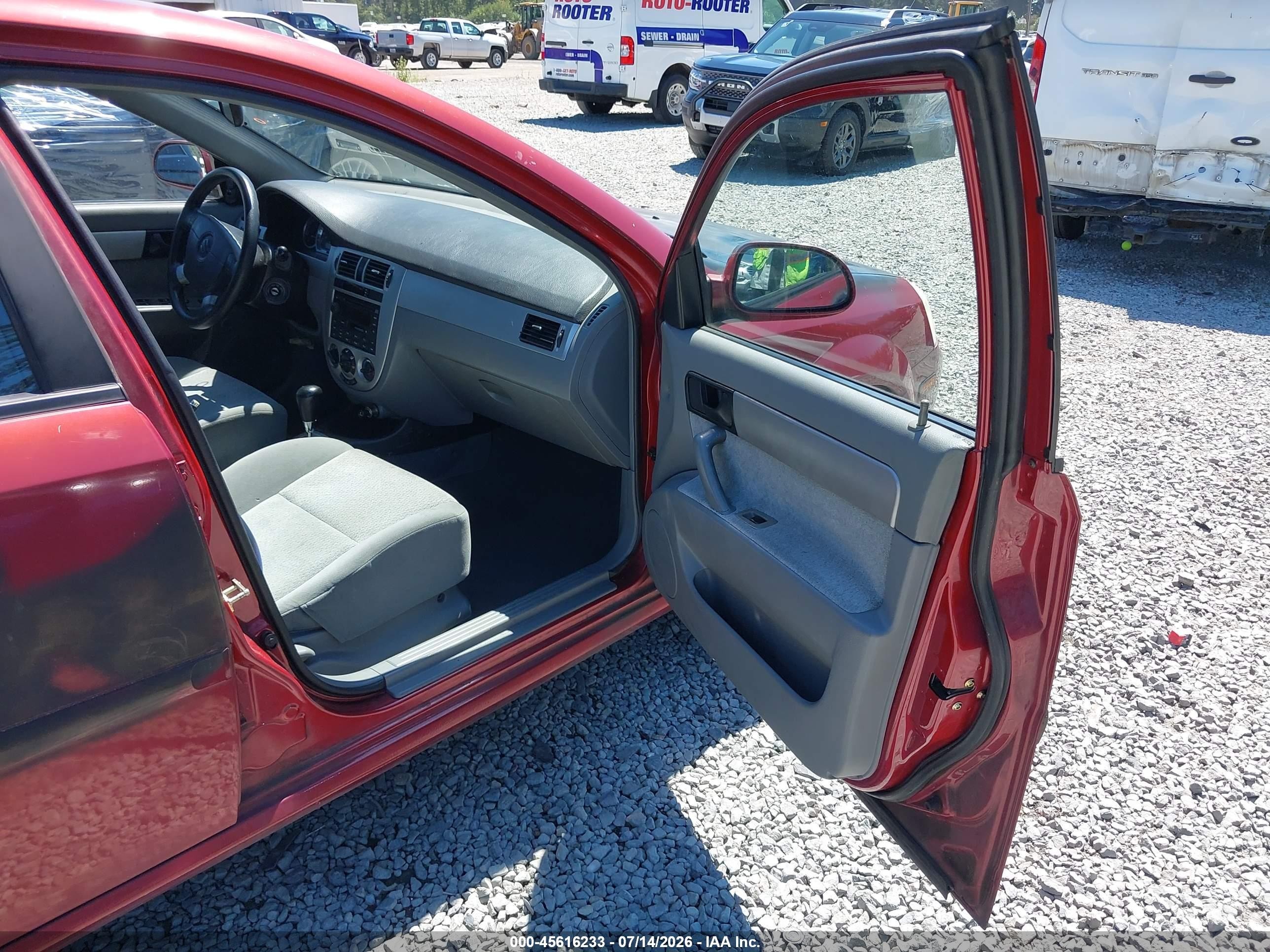 2004 Suzuki Forenza S Red vin: KL5JD52Z64K955001