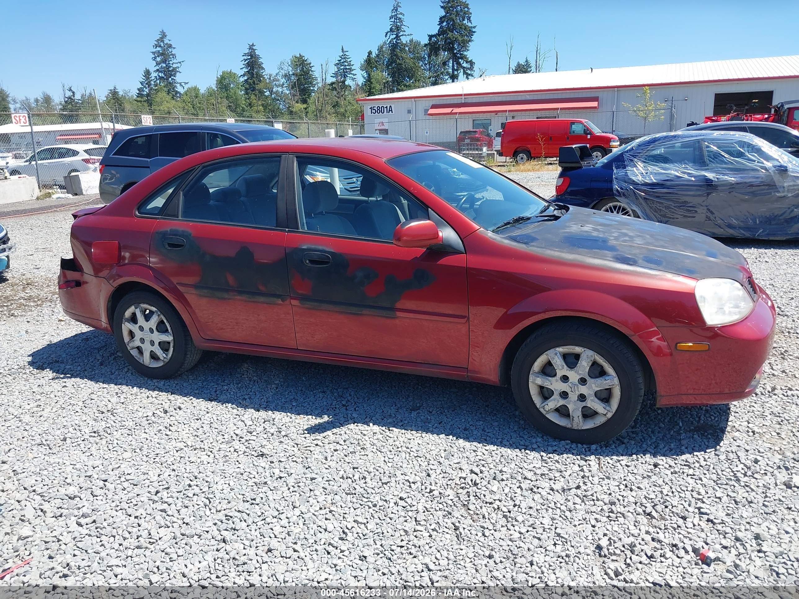 2004 Suzuki Forenza S Red vin: KL5JD52Z64K955001