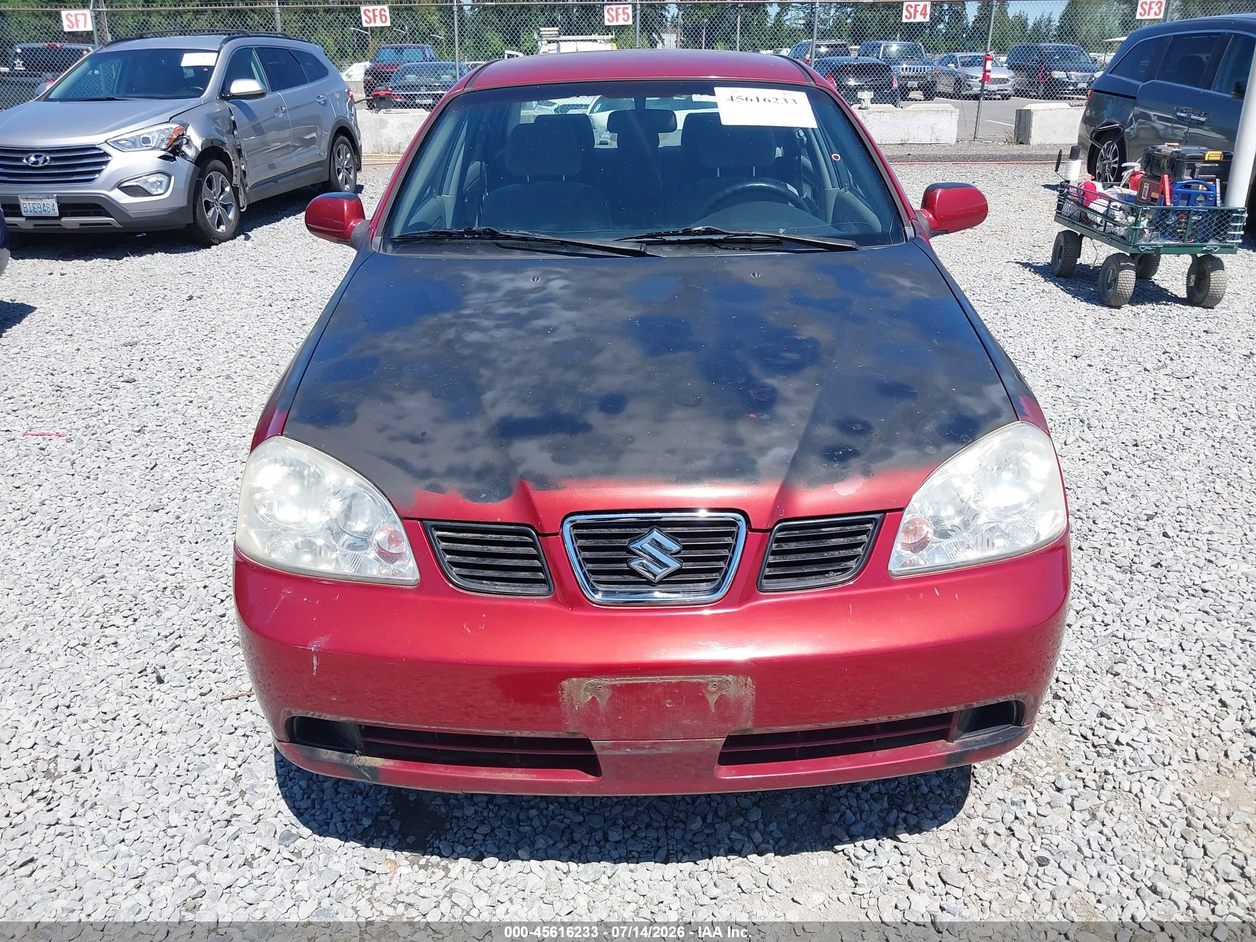 2004 Suzuki Forenza S Red vin: KL5JD52Z64K955001