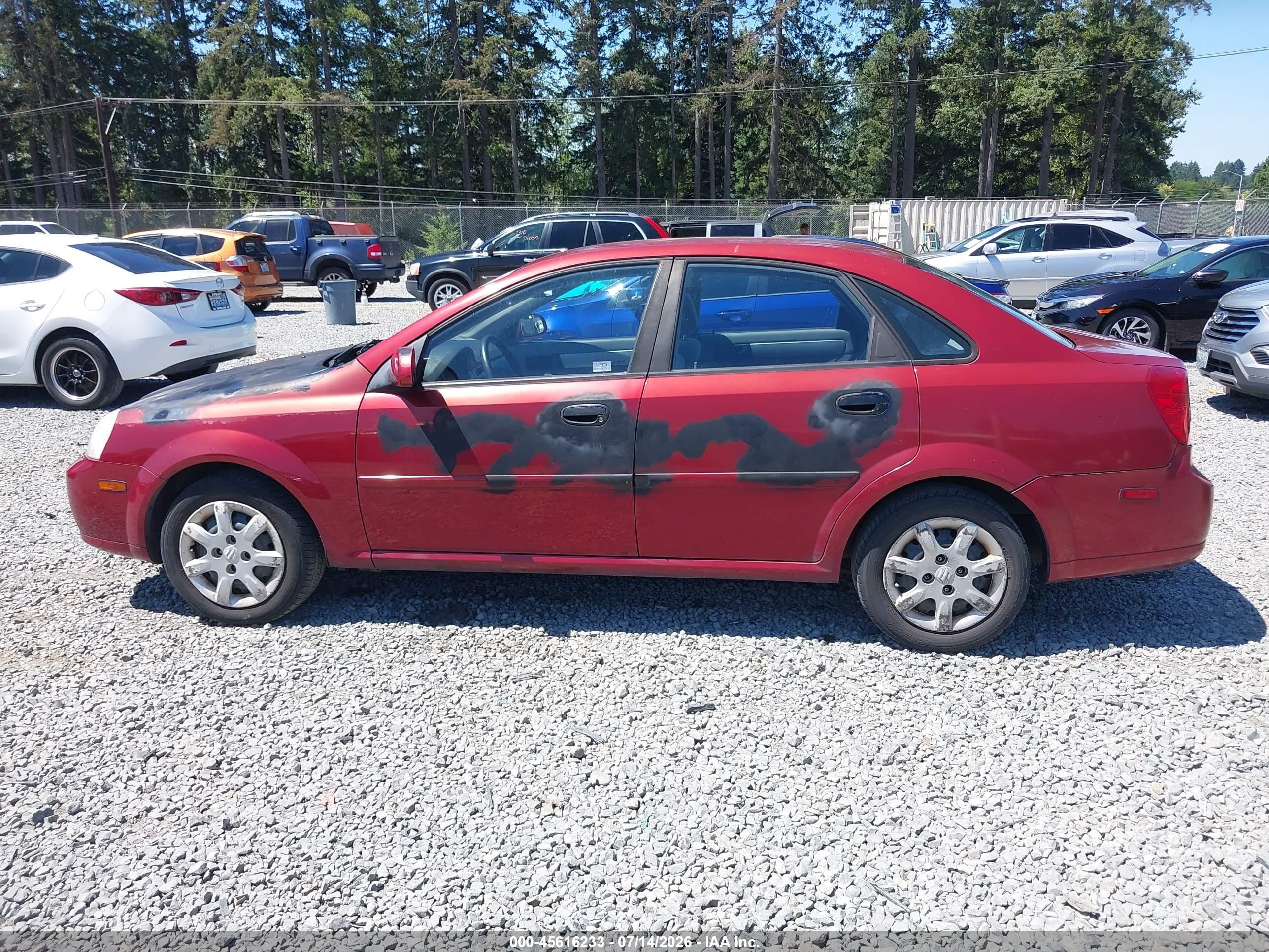 2004 Suzuki Forenza S Red vin: KL5JD52Z64K955001