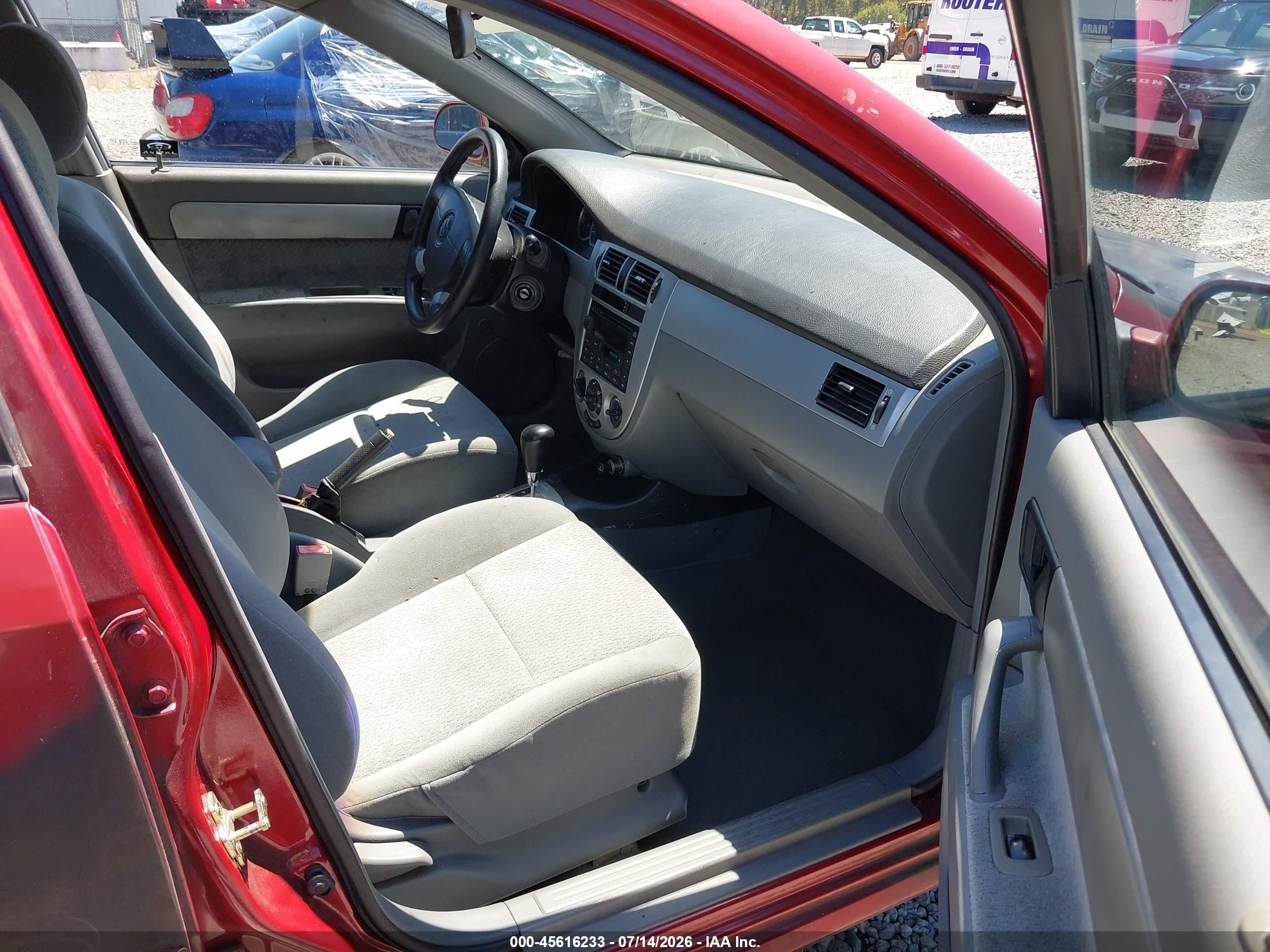 2004 Suzuki Forenza S Red vin: KL5JD52Z64K955001