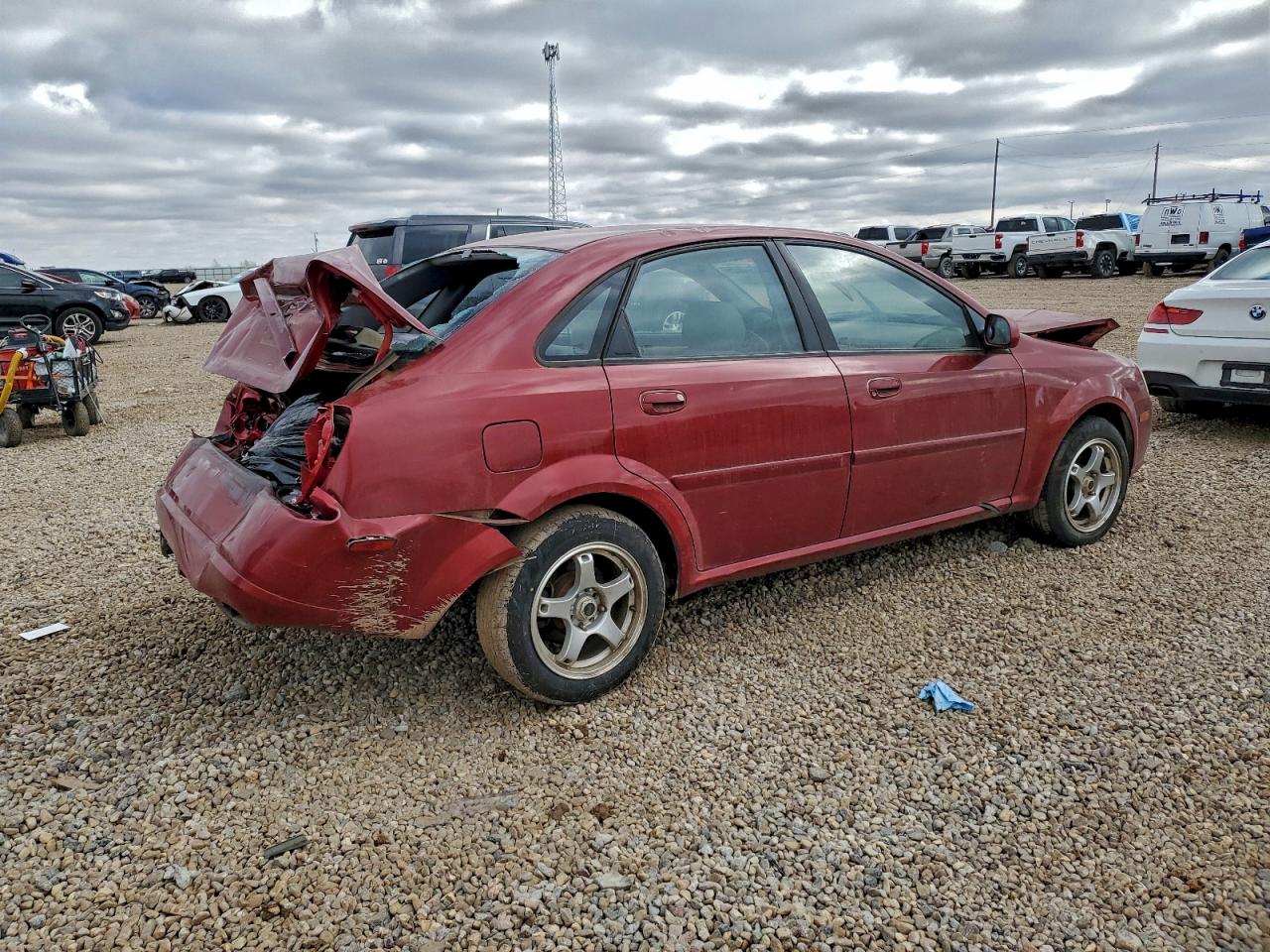 2004 Suzuki Forenza S Maroon vin: KL5JD52Z74K943620