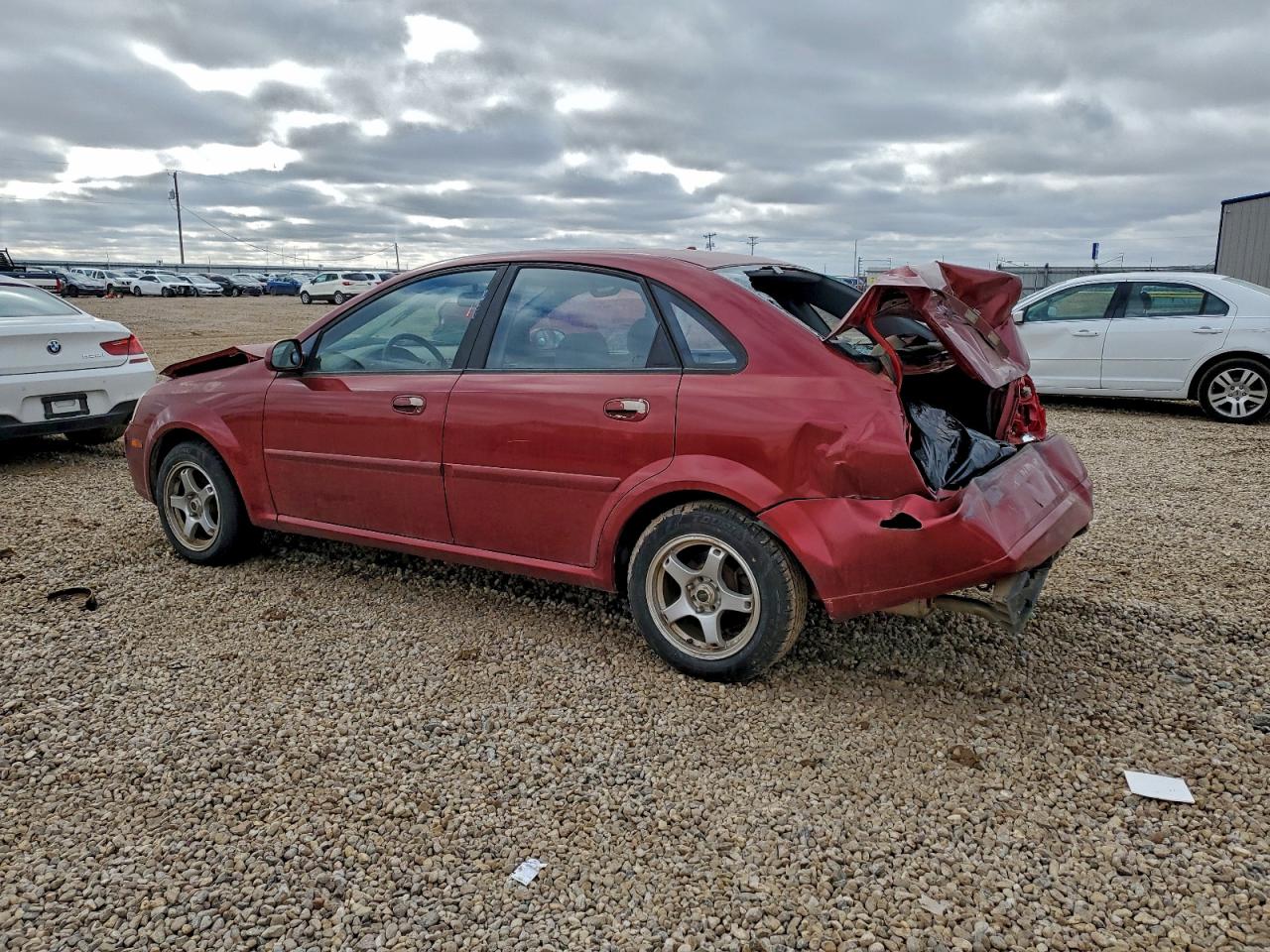 2004 Suzuki Forenza S Maroon vin: KL5JD52Z74K943620