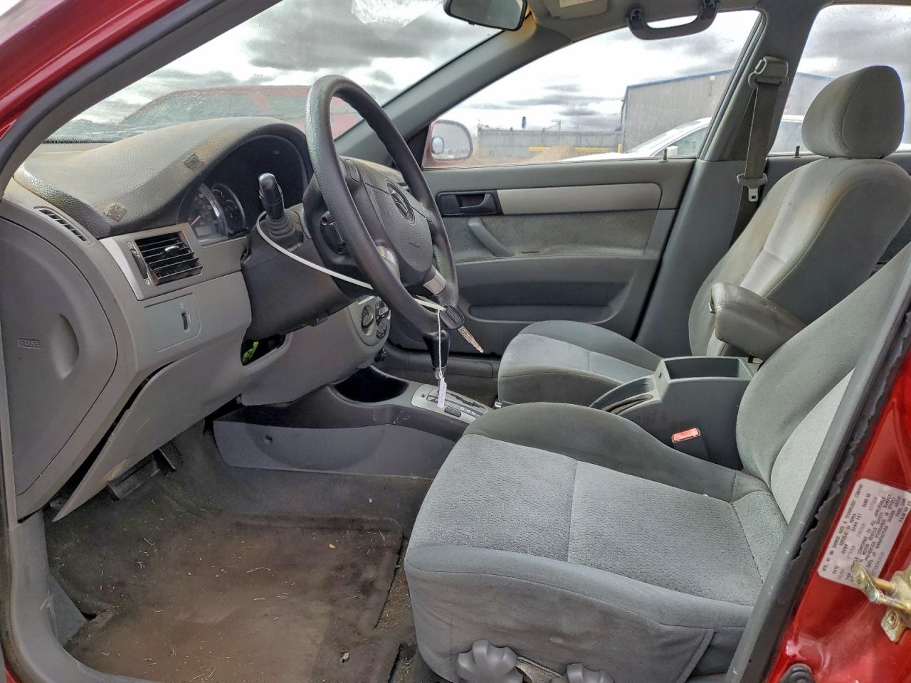 2004 Suzuki Forenza S Maroon vin: KL5JD52Z74K943620