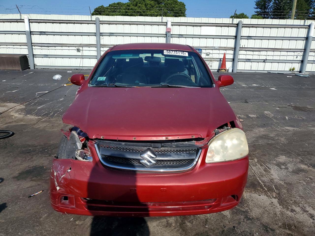 2006 Suzuki Forenza Red vin: KL5JD56Z06K424325