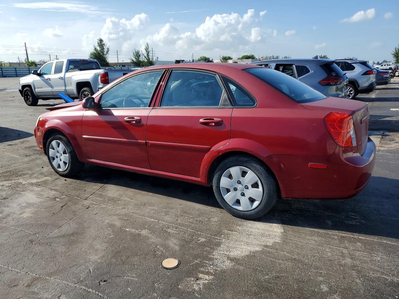 2006 Suzuki Forenza Red vin: KL5JD56Z06K424325
