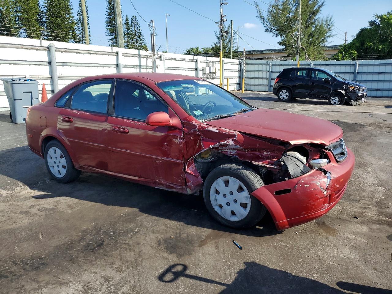 2006 Suzuki Forenza Red vin: KL5JD56Z06K424325
