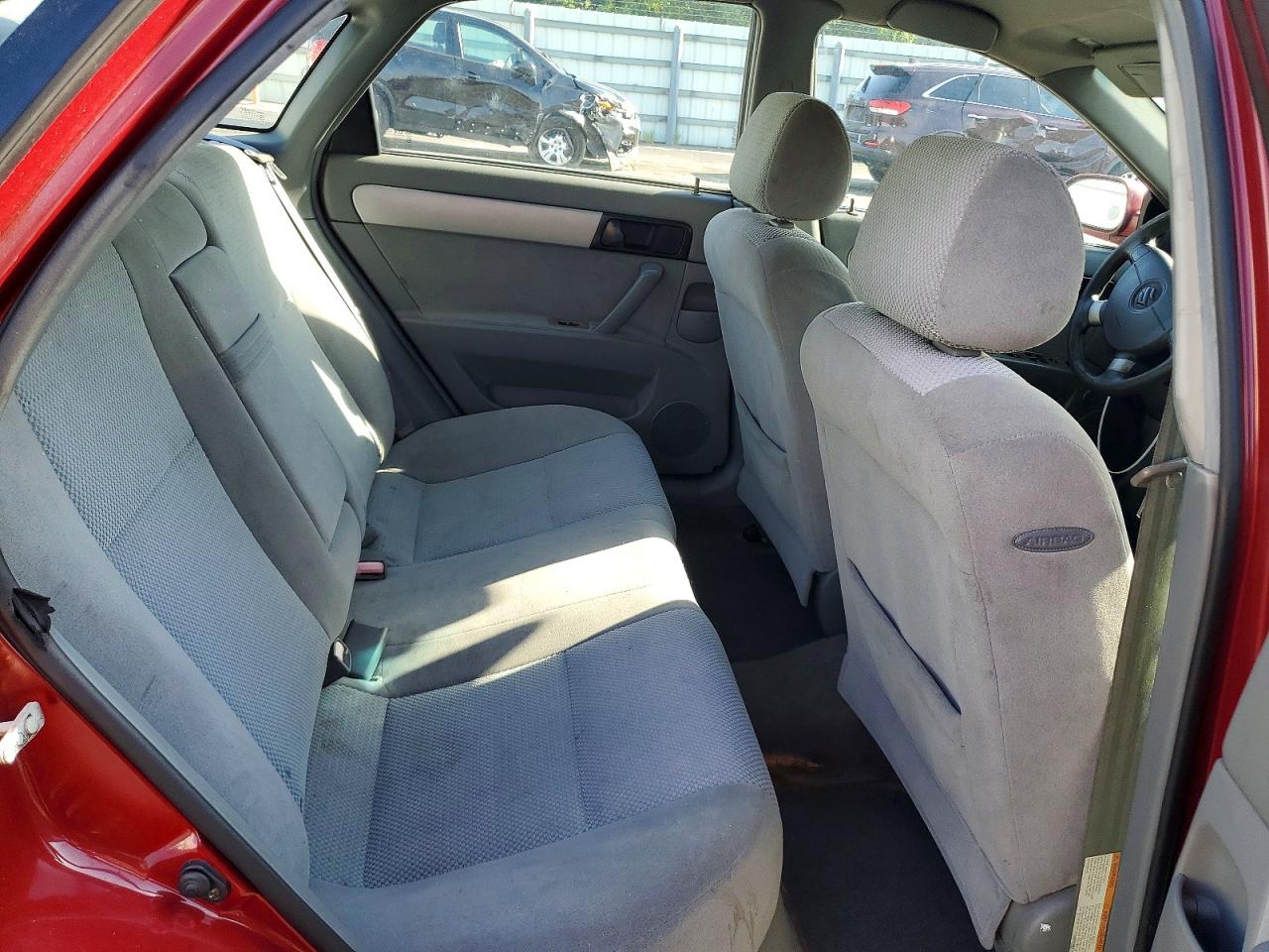 2006 Suzuki Forenza Red vin: KL5JD56Z06K424325