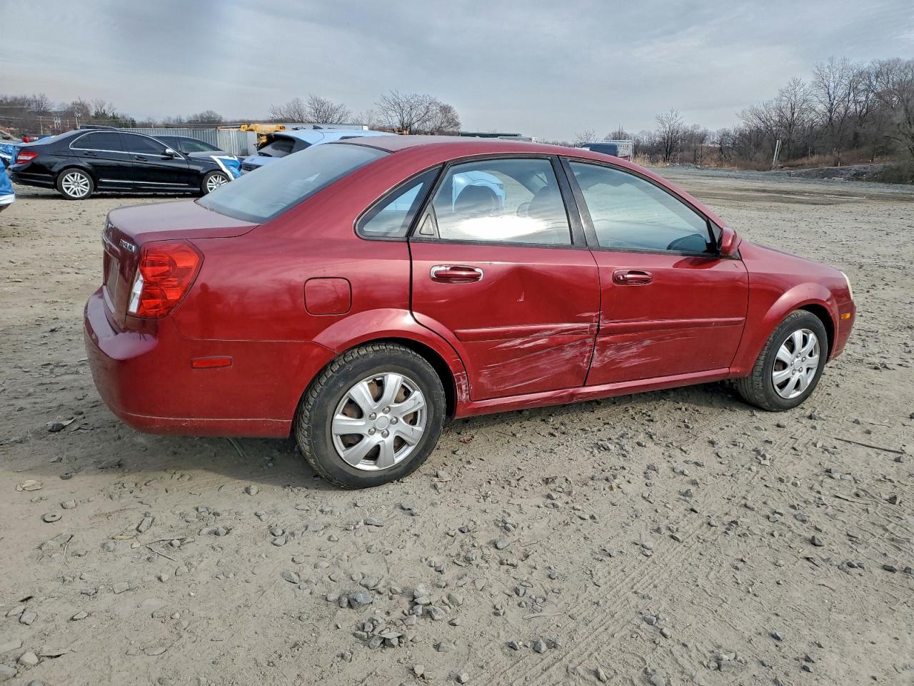 2006 Suzuki Forenza Red vin: KL5JD56Z16K293616