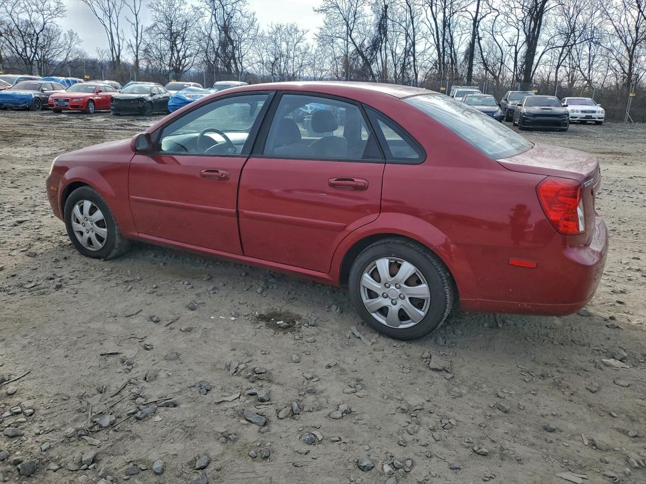 2006 Suzuki Forenza Red vin: KL5JD56Z16K293616