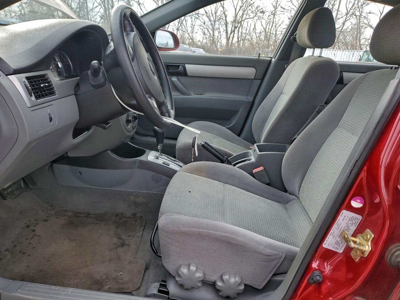 2006 Suzuki Forenza Red vin: KL5JD56Z16K293616