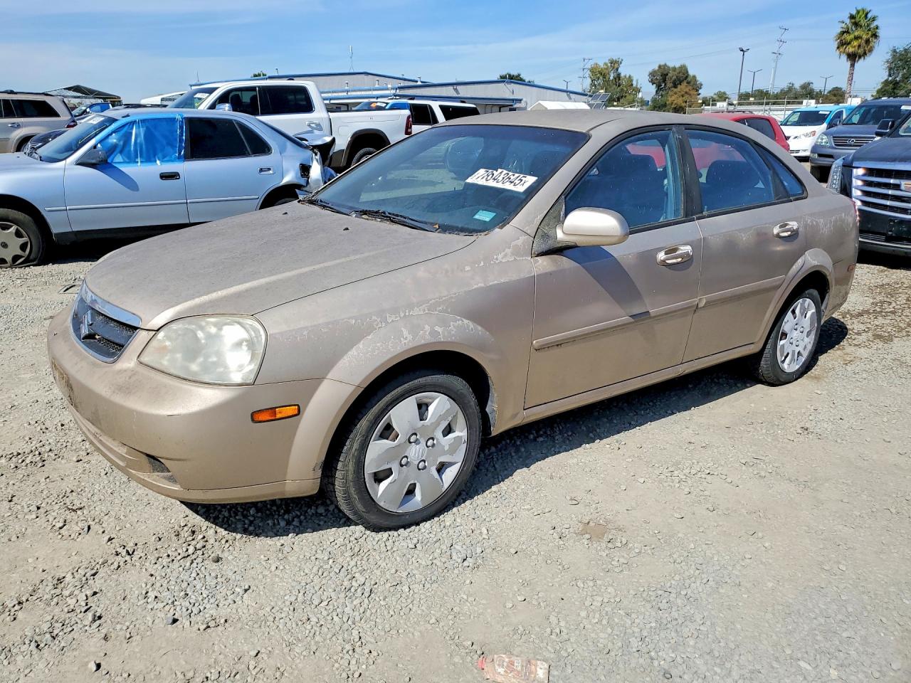 2007 Suzuki Forenza Gold vin: KL5JD56Z17K636779