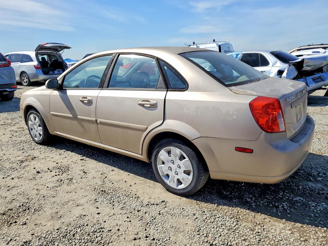 2007 Suzuki Forenza Золотой vin: KL5JD56Z17K636779