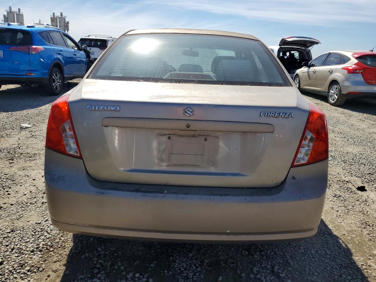 2007 Suzuki Forenza Золотой vin: KL5JD56Z17K636779