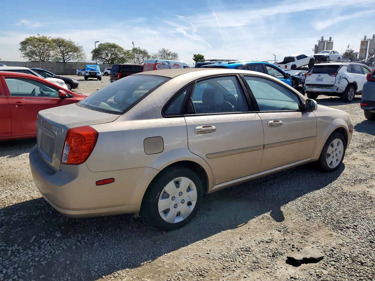 2007 Suzuki Forenza Золотой vin: KL5JD56Z17K636779