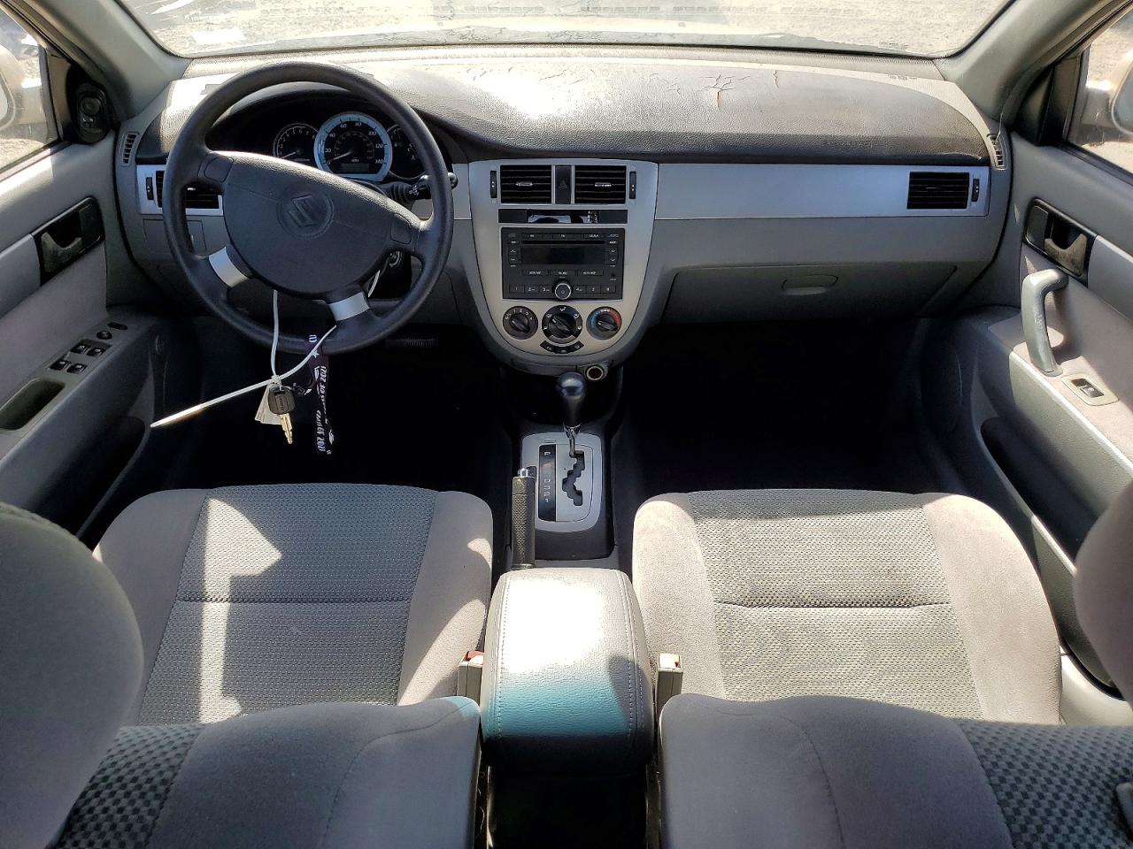 2007 Suzuki Forenza Золотой vin: KL5JD56Z17K636779