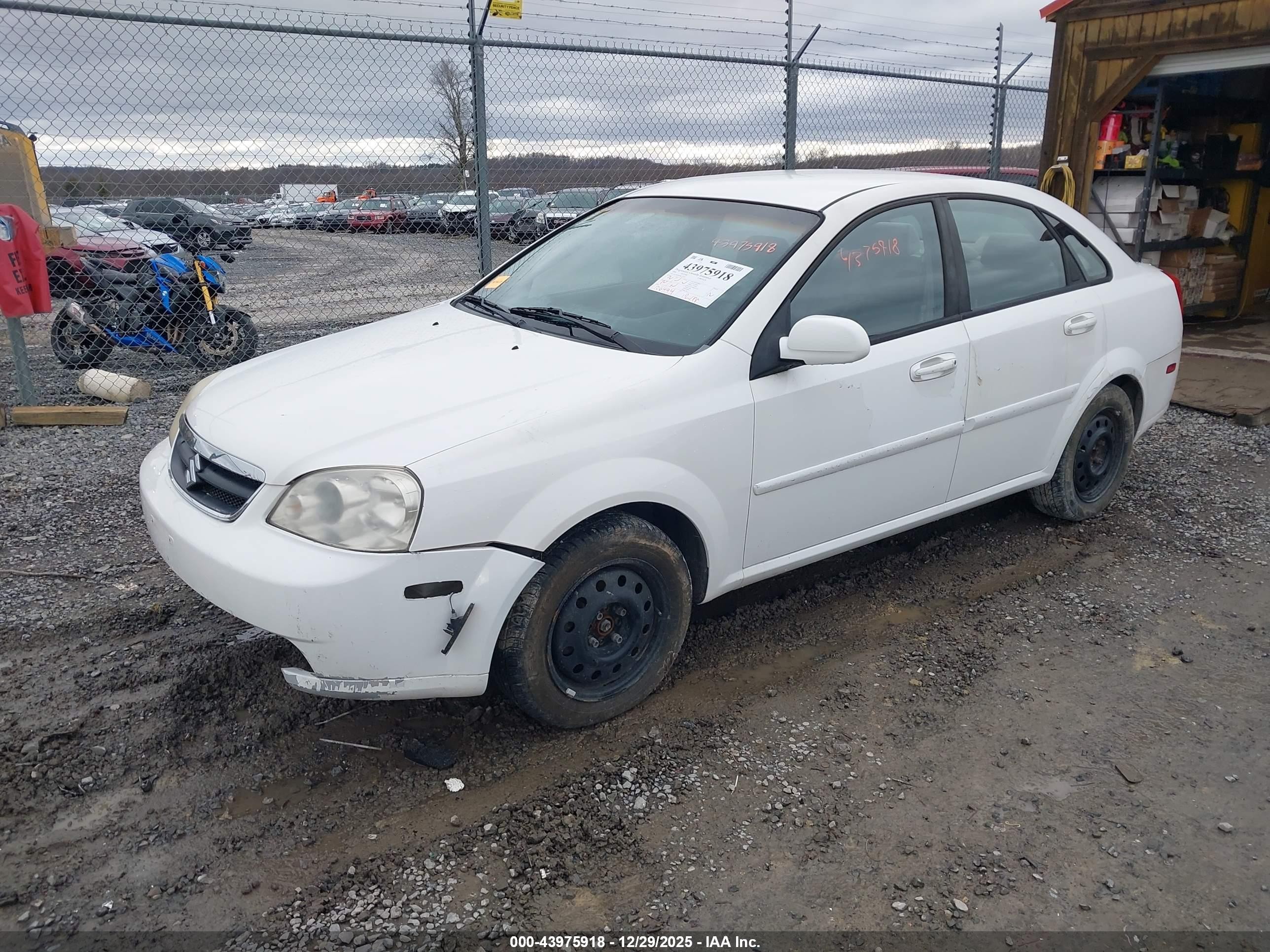 2006 Suzuki Forenza   White vin: KL5JD56Z46K333557