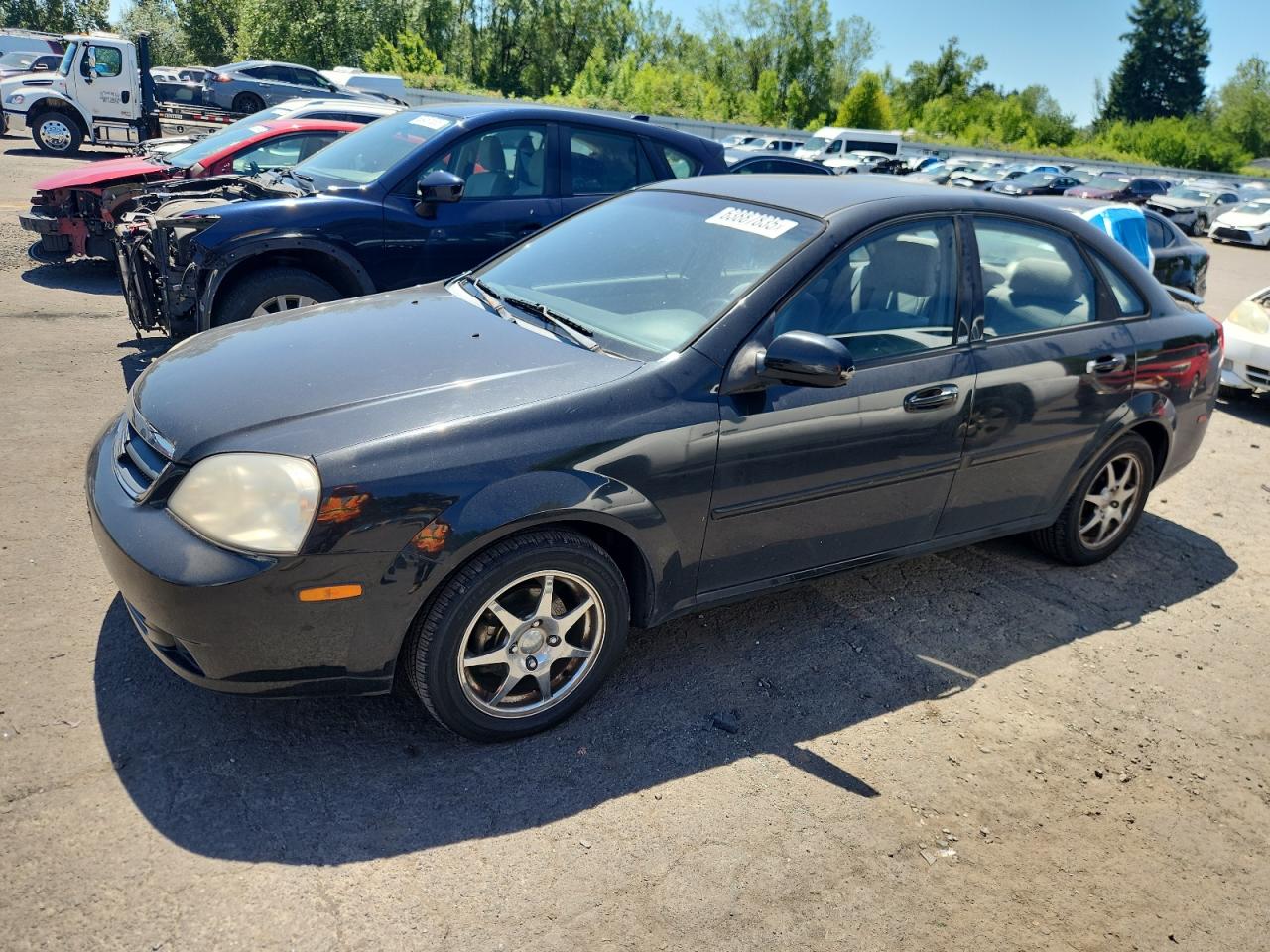 2006 Suzuki Forenza Black vin: KL5JD56Z56K409111